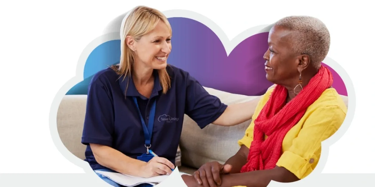 Healthcare worker consulting with a patient in a friendly setting.